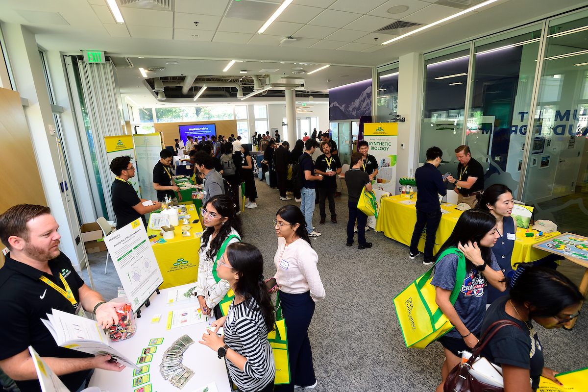 Attendees explore booths, interact with exhibitors, and learn about research innovations during the lively BioFestival event hosted by Zymo Research.