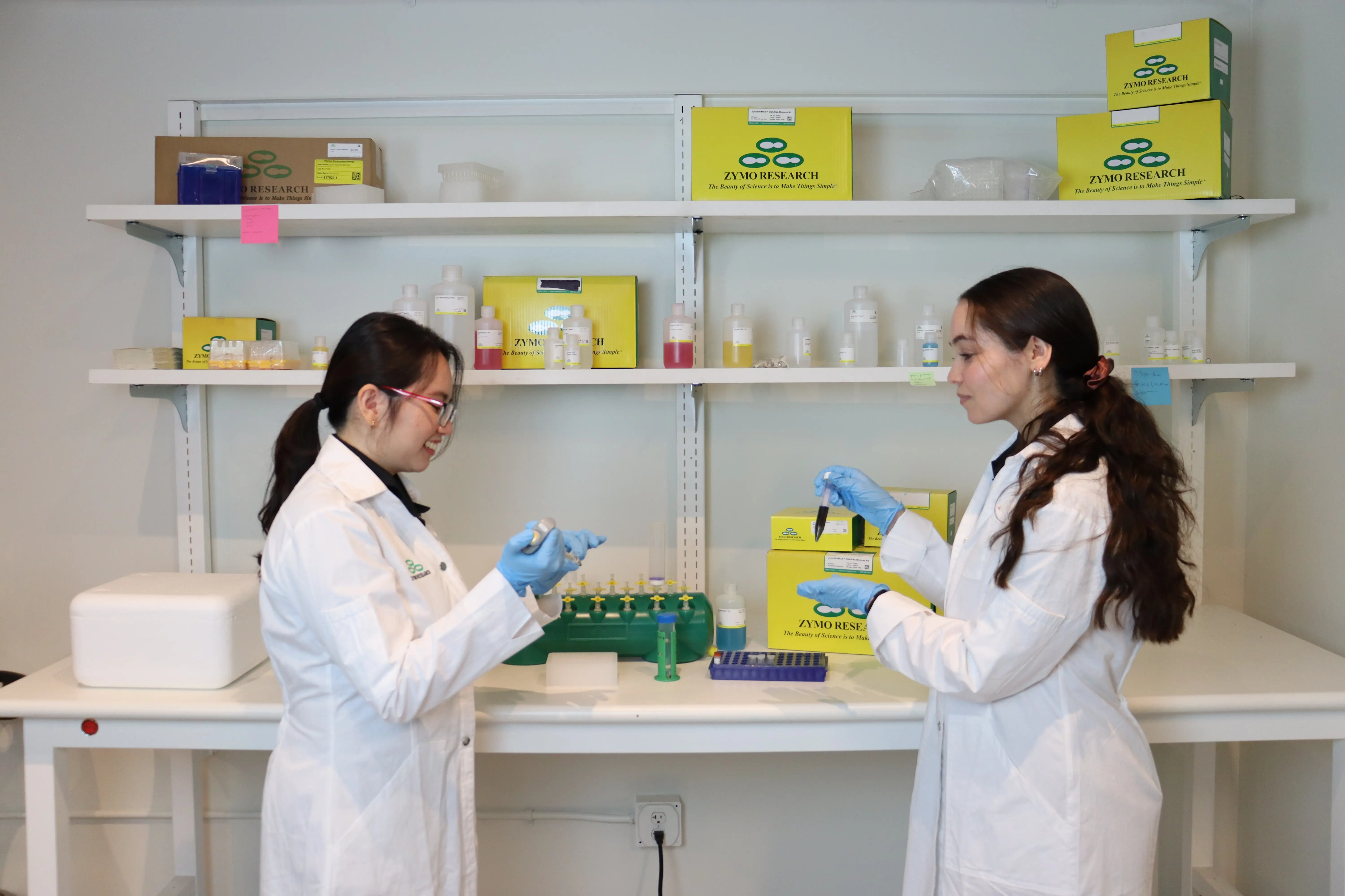 Two scientists working in zymo lab