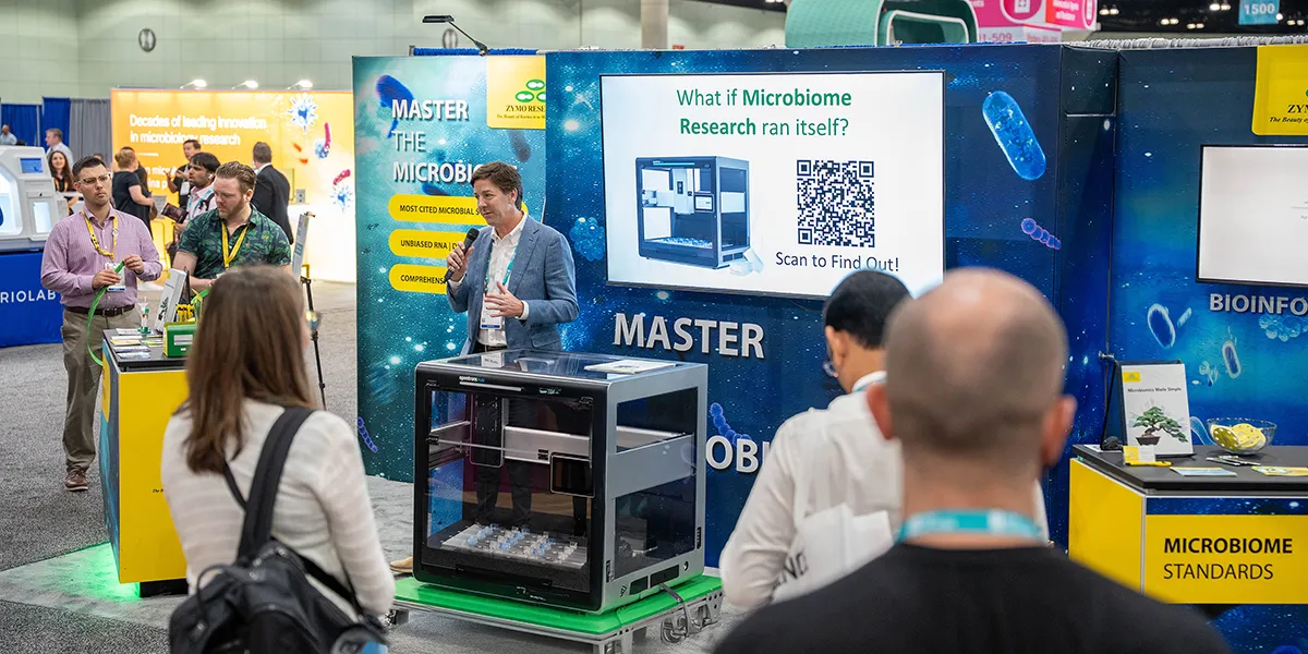Attendees gather for a live demo showcasing how the MultiOmiX Workstation streamlines bottlenecks in microbiome sample processing.