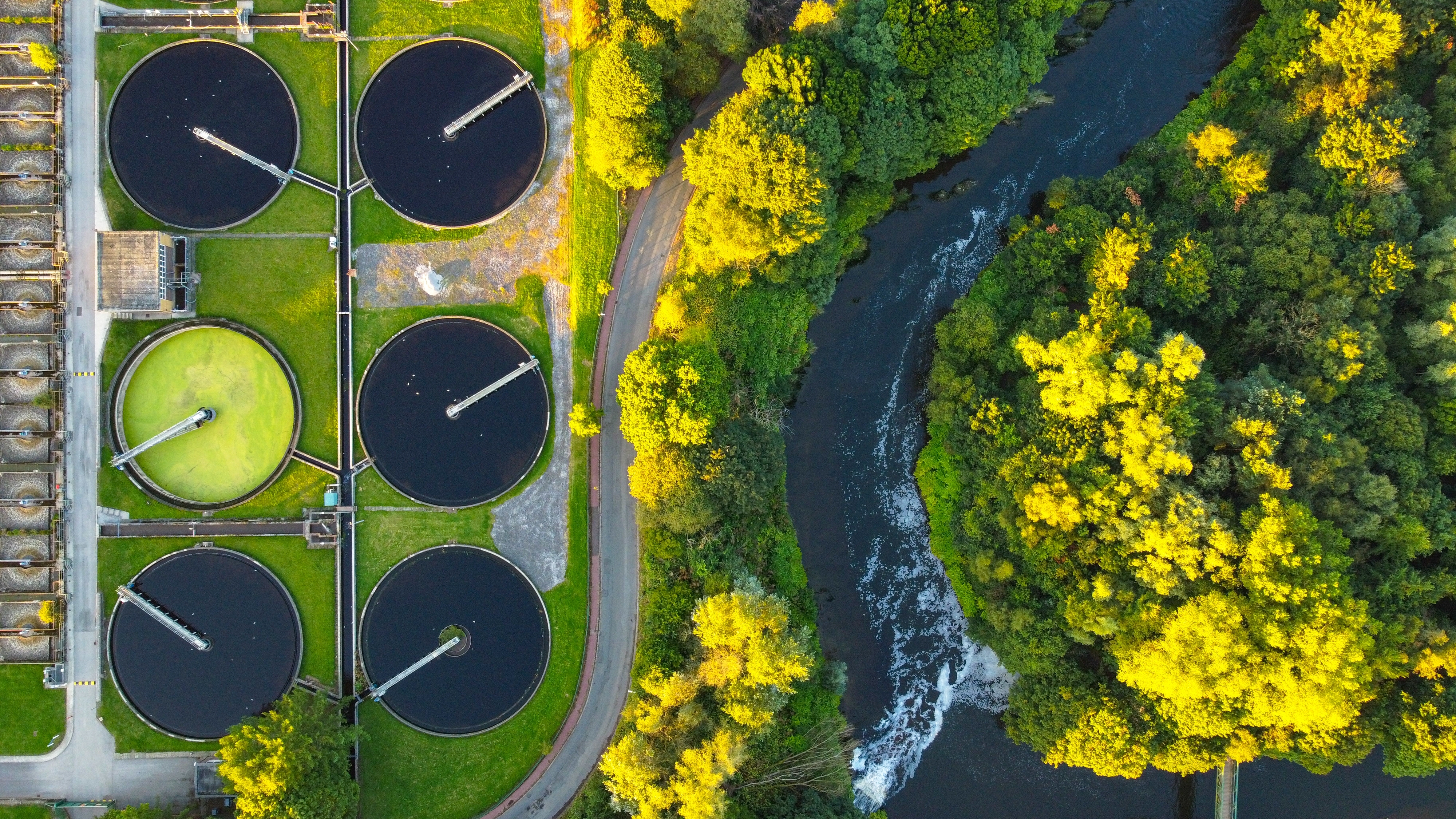 Wastewater cisterns in a treatment plant, utilized to process and purify wastewater.