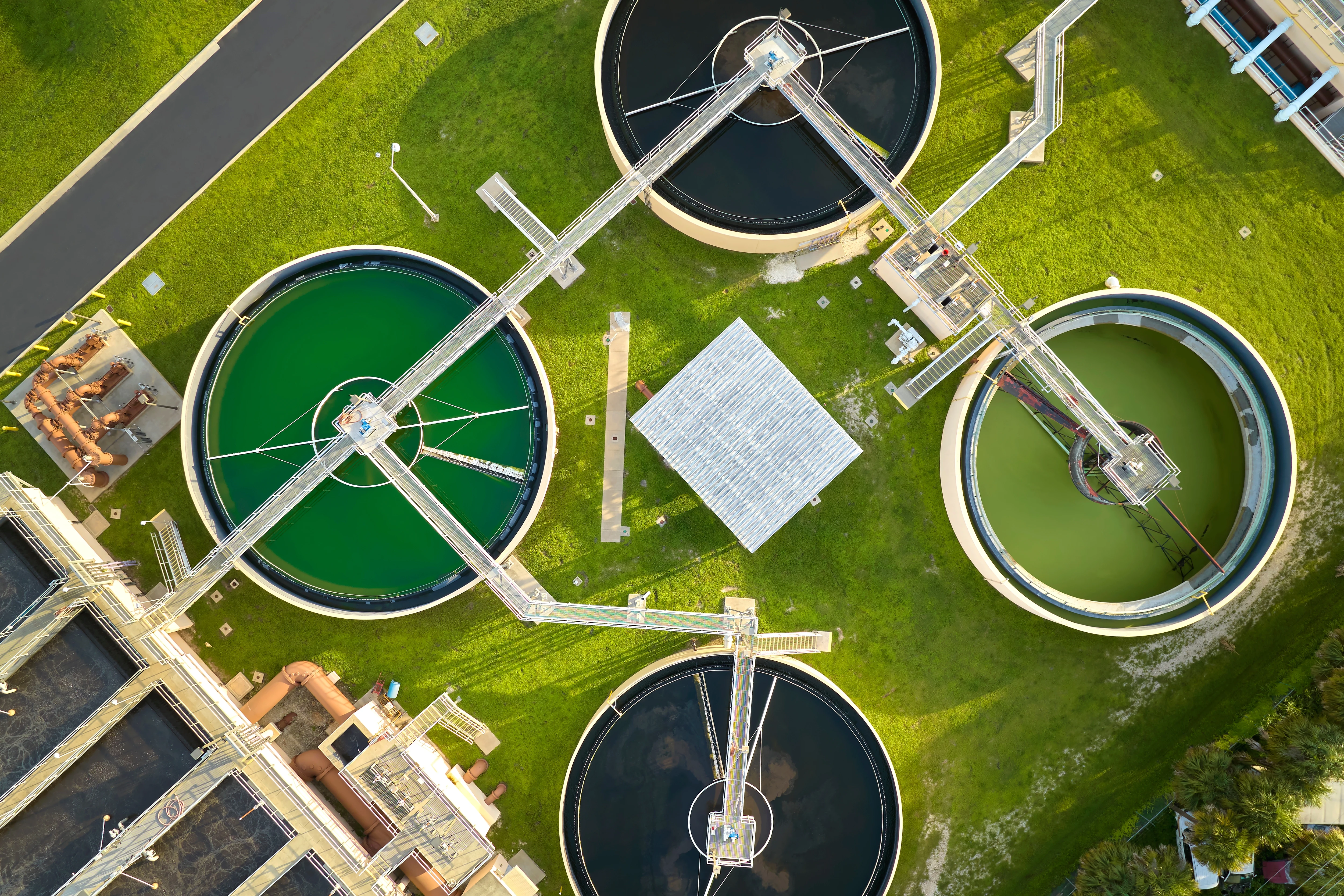 Aerial view of water tanks at water treatment facility.